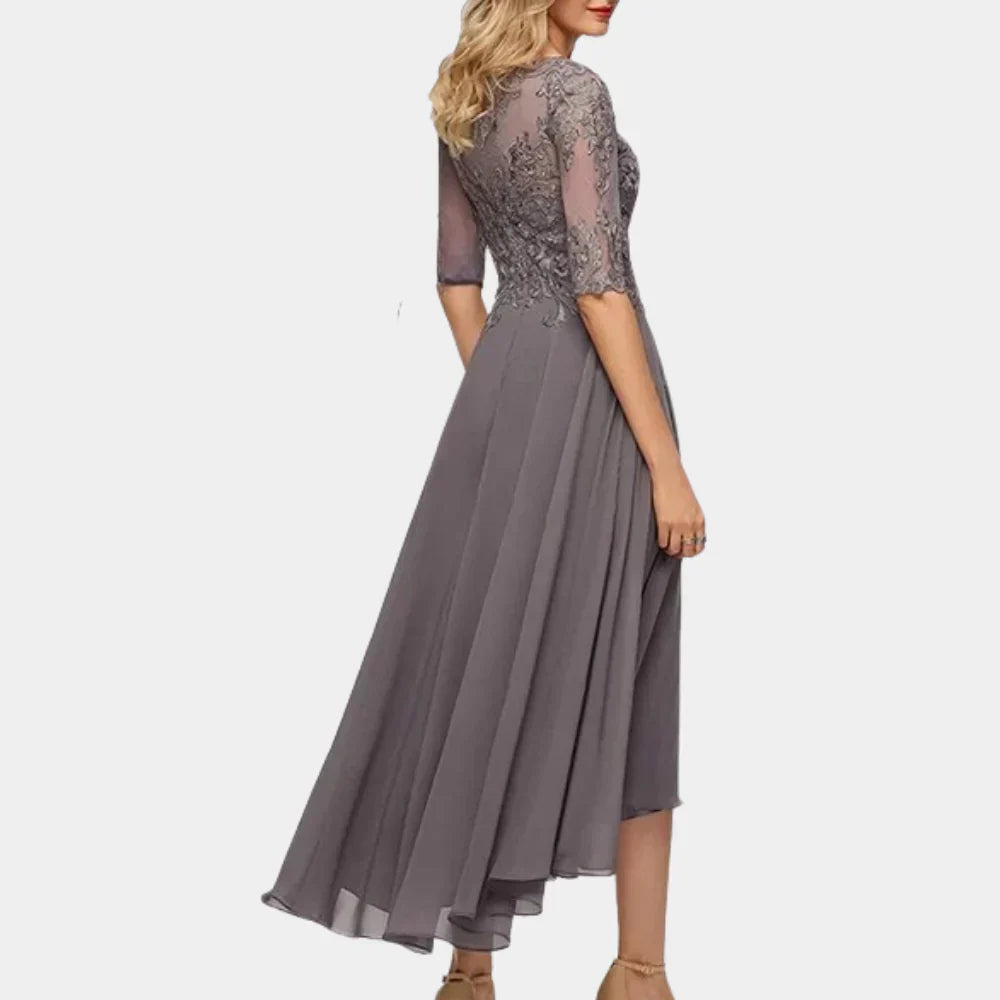 Bela– Elegante jurk met driekwartmouwen Met kantdetails en vloeiende rok