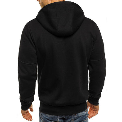 Homme portant un sweat à capuche noir, vu de dos, avec jeans bleus. Mode décontractée, vêtement tendance pour homme, style urbain.
