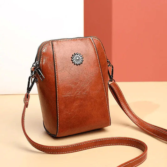Kleine Crossbody-Tasche in Lederoptik mit mehreren Fächern – Verstellbarer Riemen Zorenza
