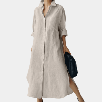 Light blue linen shirt dress with a relaxed fit and button-down front, perfect for casual summer outings. 1