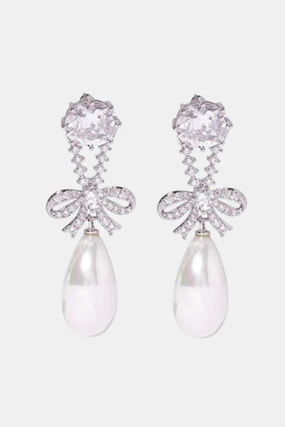 Lynell – Silver Bow Drop Pearl Earrings