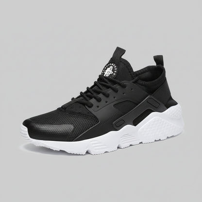 Herresneakers med lav top og afrundet tå og snørelukning