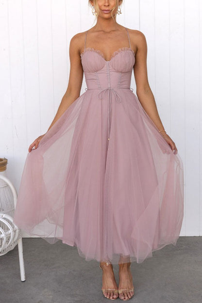 Dresses - A midi cocktail dress featuring a fitted bodice with a corset design and a flowing tulle skirt. 4
