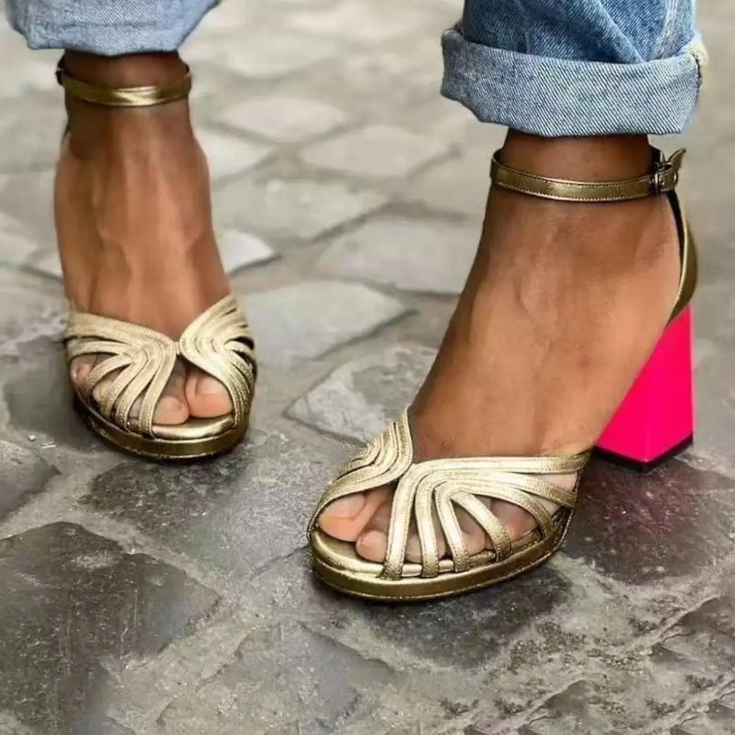 Women's heeled sandals with an ankle strap, featuring a sleek design and open toe. 0