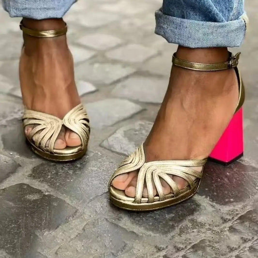 Women's heeled sandals with an ankle strap, featuring a sleek design and open toe. 0