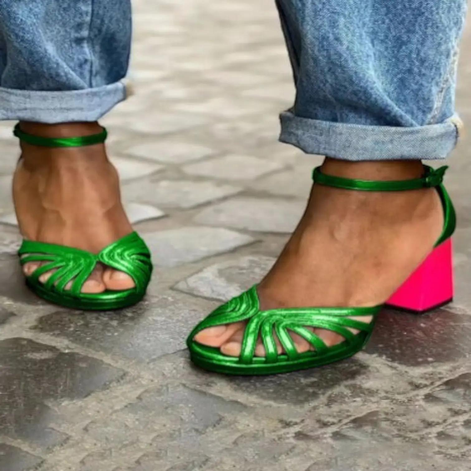 Women's heeled sandals with an ankle strap, featuring a sleek design and open toe. 2