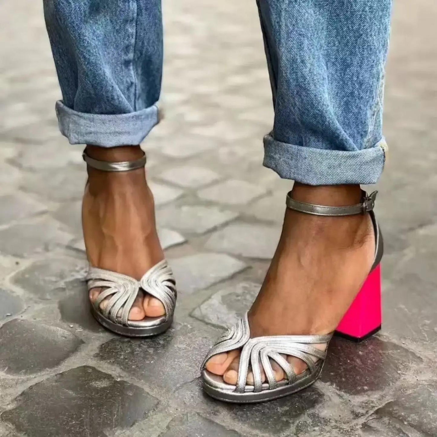 Women's heeled sandals with an ankle strap, featuring a sleek design and open toe. 3