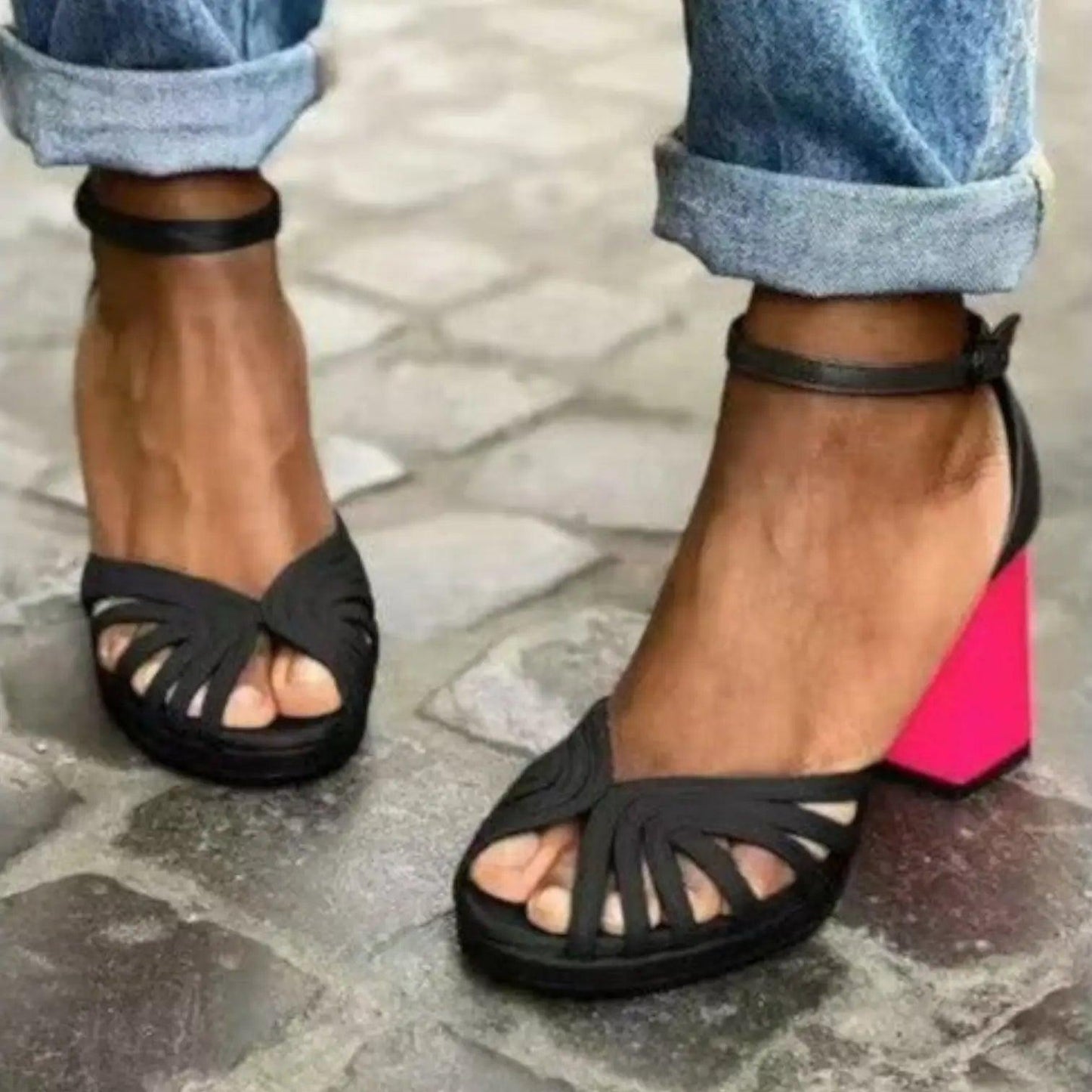 Women's heeled sandals with an ankle strap, featuring a sleek design and open toe. 4