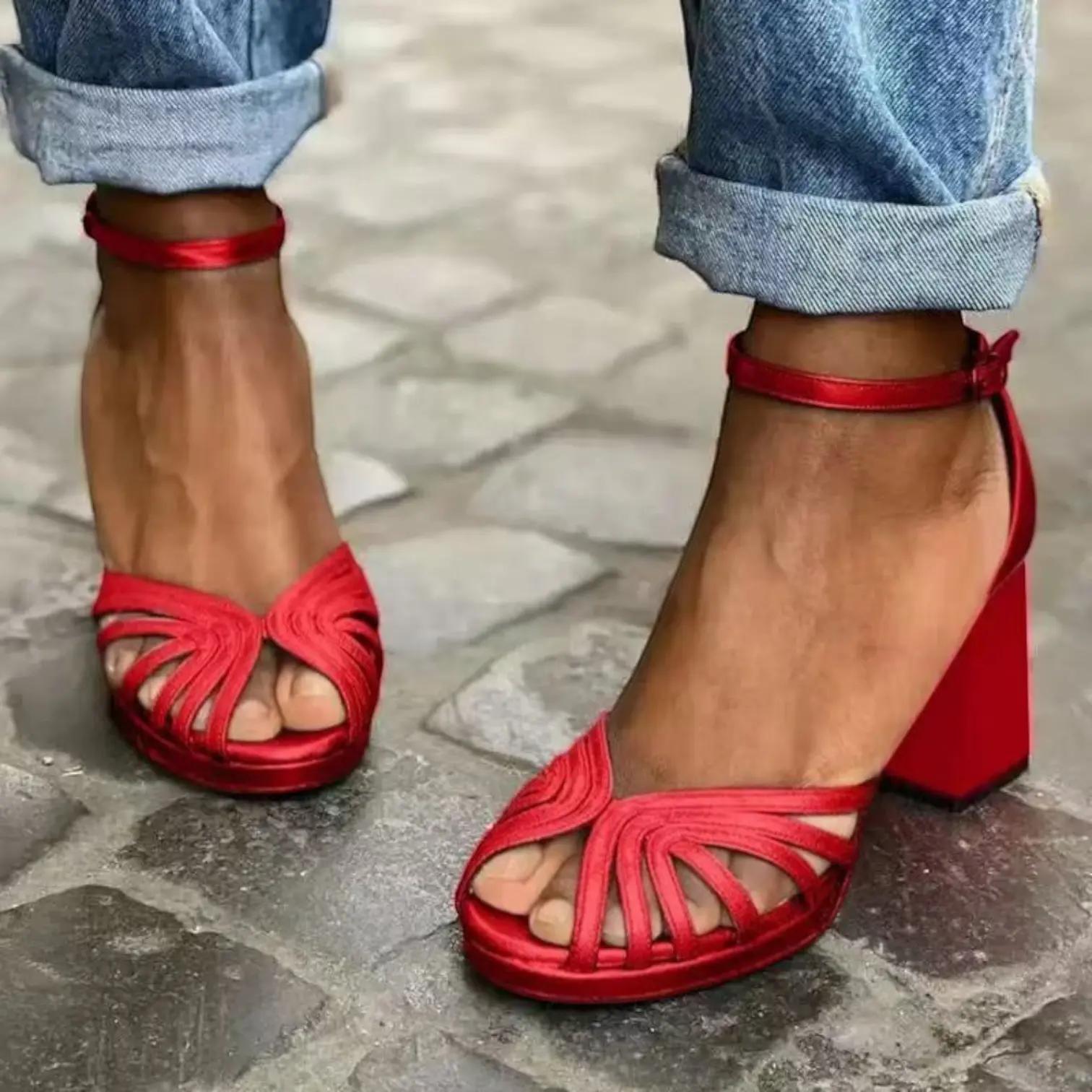 Women's heeled sandals with an ankle strap, featuring a sleek design and open toe. 5