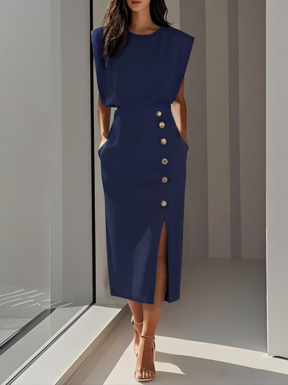 Midi dress with a button-down front and a side slit, designed for women. 1