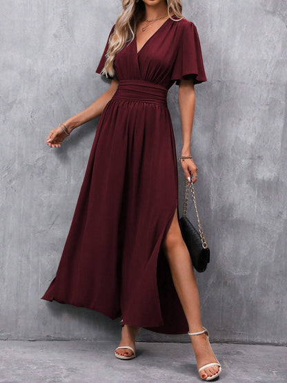 Elfrieda | Elegante Vestido Largo Con Cuello En V, Mangas Transparentes Y Abertura
