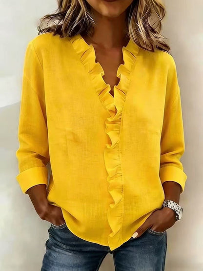 VIRELLO PARIS | Blouse à col en V et fines volants