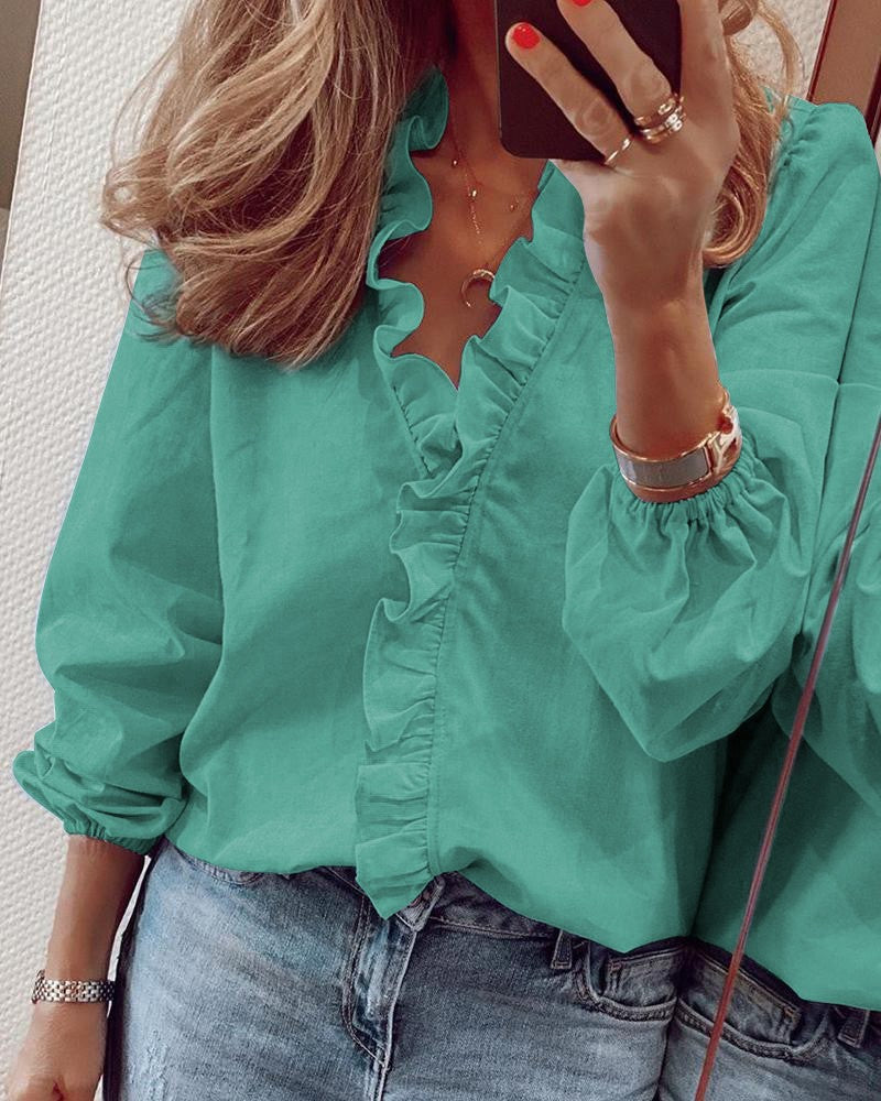 Feminine Bluse med Flatterende Detaljer fra ModeLuxe