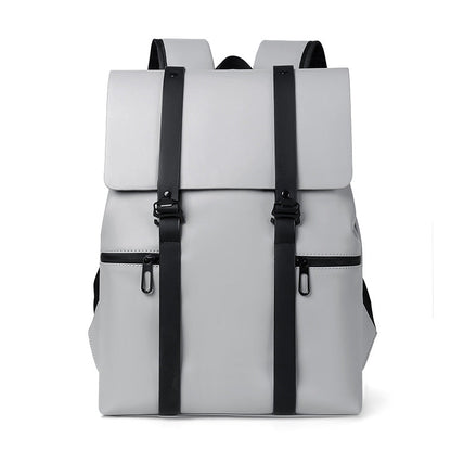 Sac à dos gris moderne avec bretelles noires, poches zippées, design minimaliste. Idéal pour école, travail, voyage. Accessoire tendance et pratique.