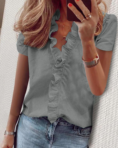 Feminine Bluse med Flatterende Detaljer fra ModeLuxe