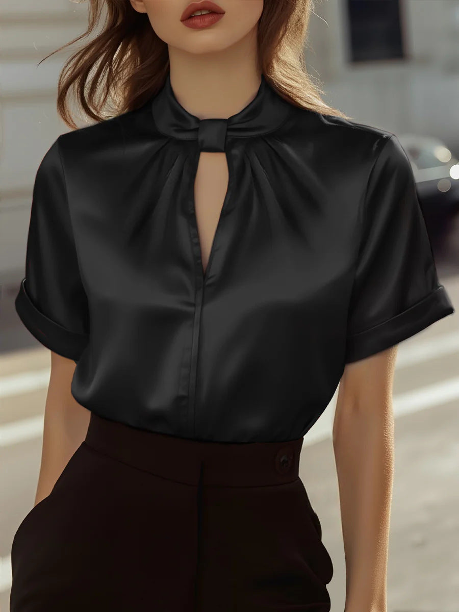 Feminine Bluse med Moderne Krave og Glitrende Finish