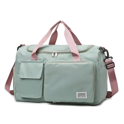 Mintgrüne Reisetasche mit rosa Trägern, geräumig, ideal für Reisen, Sport, Freizeit.