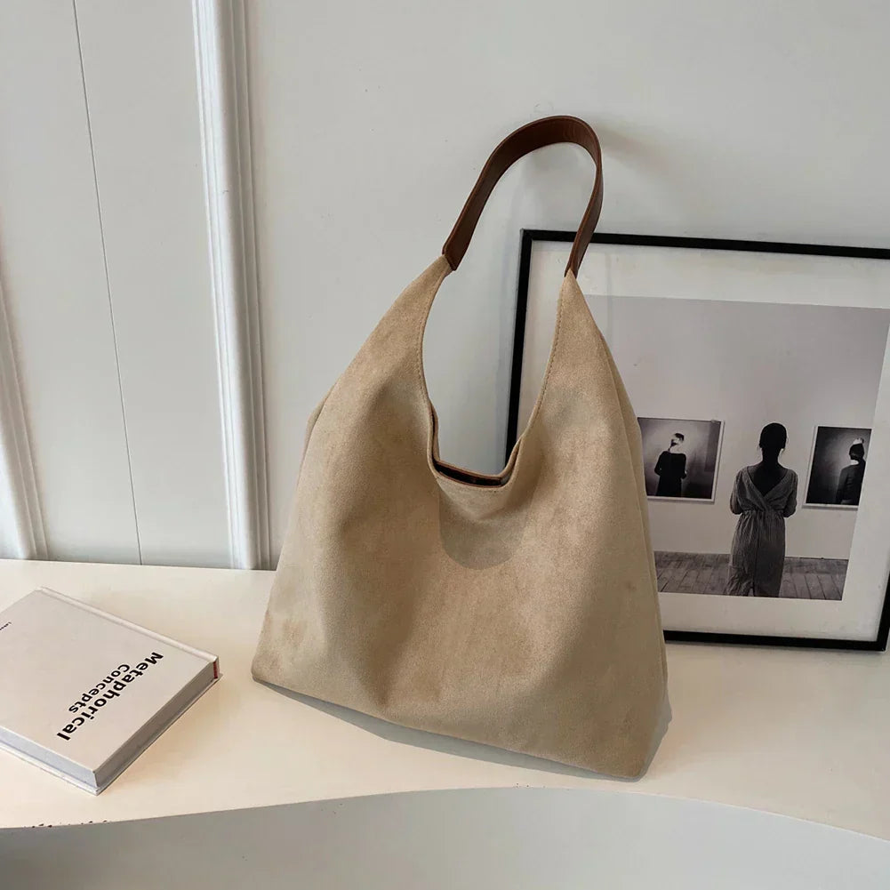 OTTILIE SUEDE SHOULDER BAG WITH MINIMALIST SHAPE