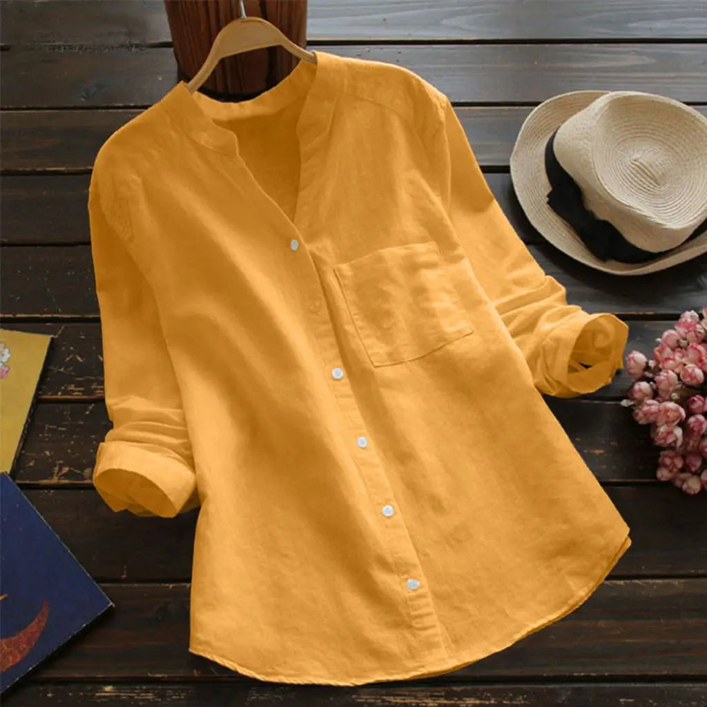 Duval Paris™ | Blouse unie à col en V