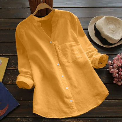 Duval Paris™ | Blouse unie à col en V