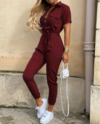 Velox - Retro jumpsuit met knopen en 70s vibes