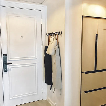 MEELANO Elegant smedejerns vægkrog i bølgeform – moderne og dekorativ opbevaringsløsning til entré, soveværelse eller garderobe