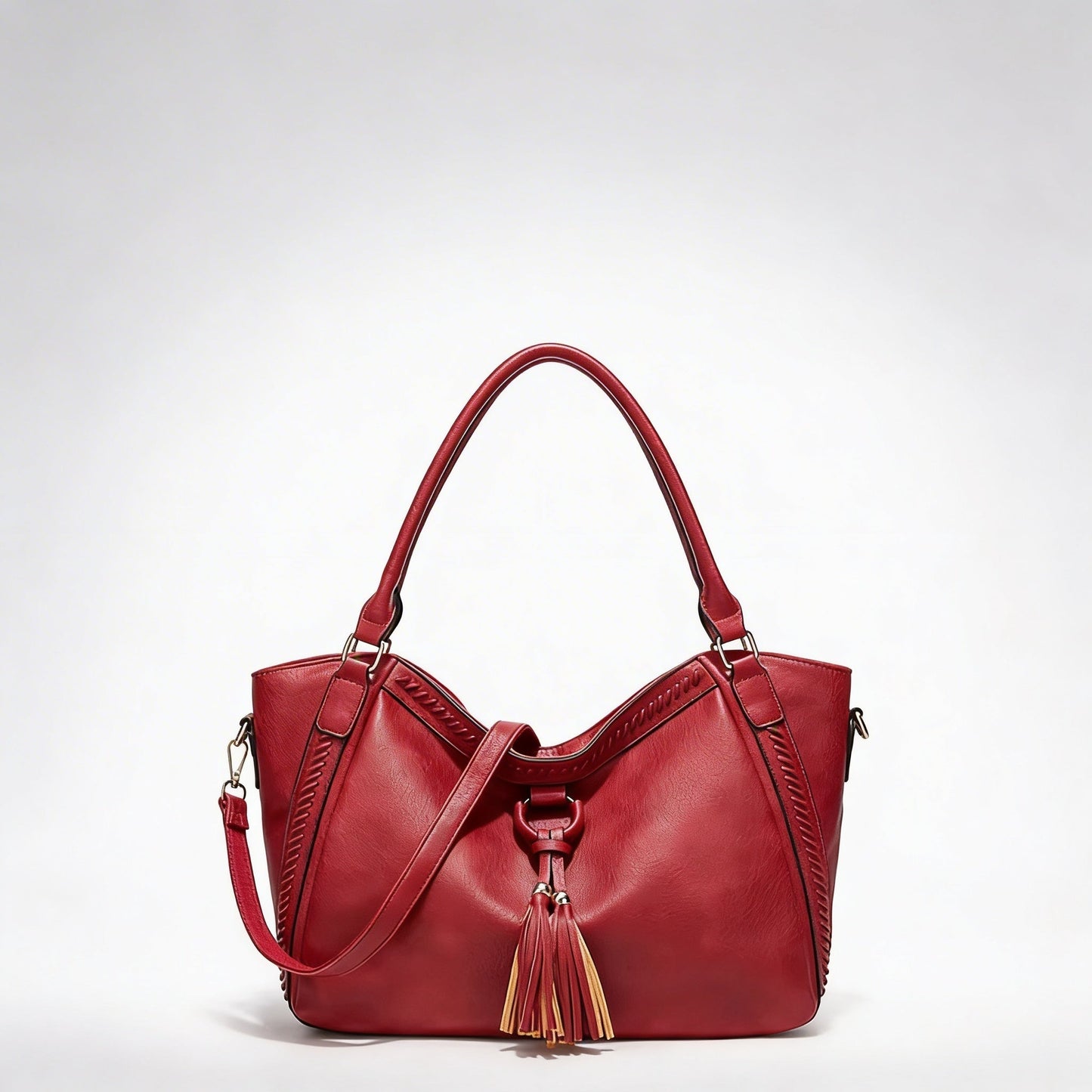 Vera | Women’s Crossbody Bag With Tassel Accent And Bold Stitch Detailing | Modern