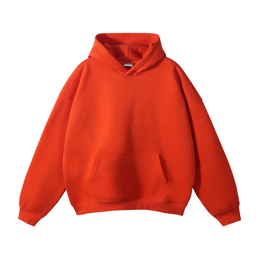 Sweat à capuche orange vif, unisexe, avec poche kangourou, manches longues. Mode décontractée, tendance automne-hiver, vêtement confortable.