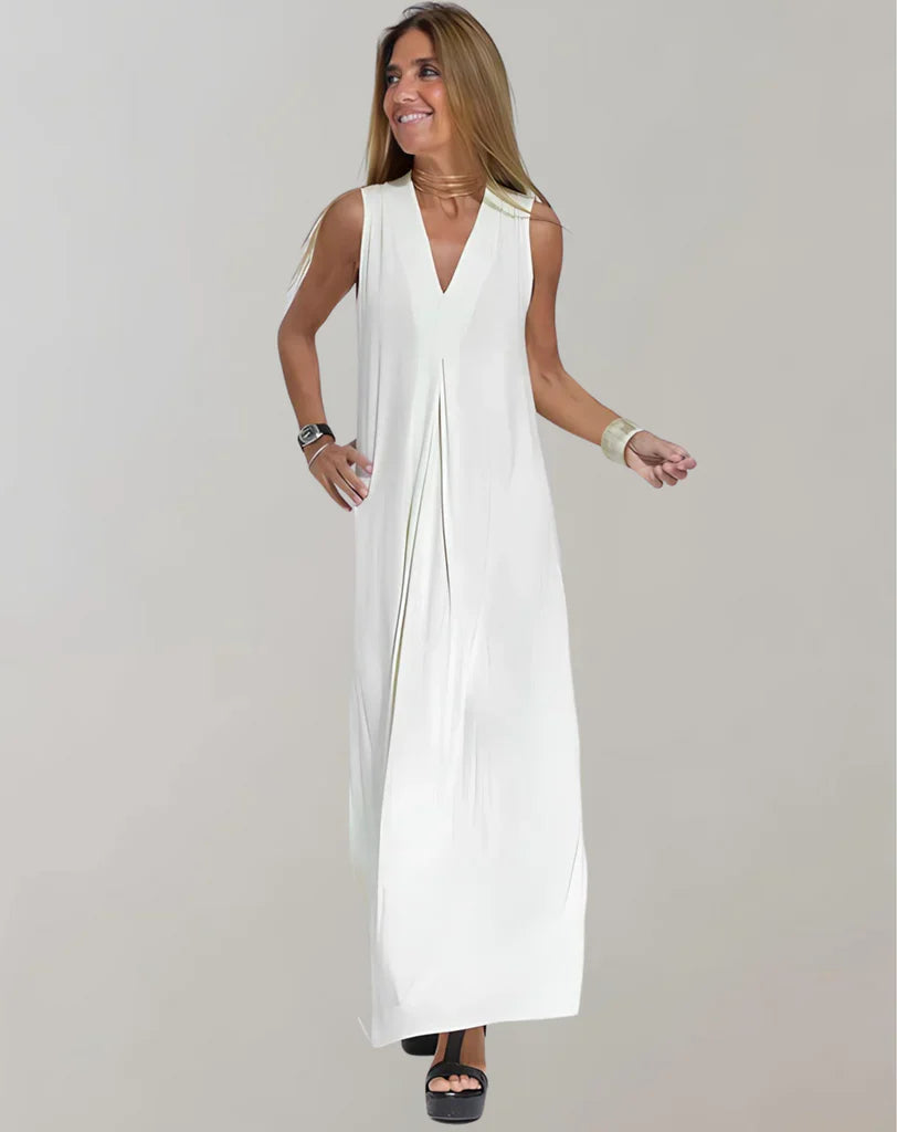 Mia - Robe longue chic sans manches avec col en V et détails plissés