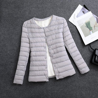 Giacca isolante leggera da donna – Indumento interno corto con scollo rotondo
