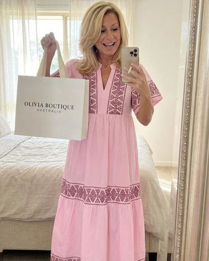 Beatrice Esposito Pleated Maxi Dress - lifestyle shot of flowing pleated maxi dress