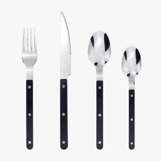 Firedelers bestiksæt med sort håndtag: gaffel, kniv, spiseske og teske i rustfrit stål. Elegant design, perfekt til moderne borddækning.