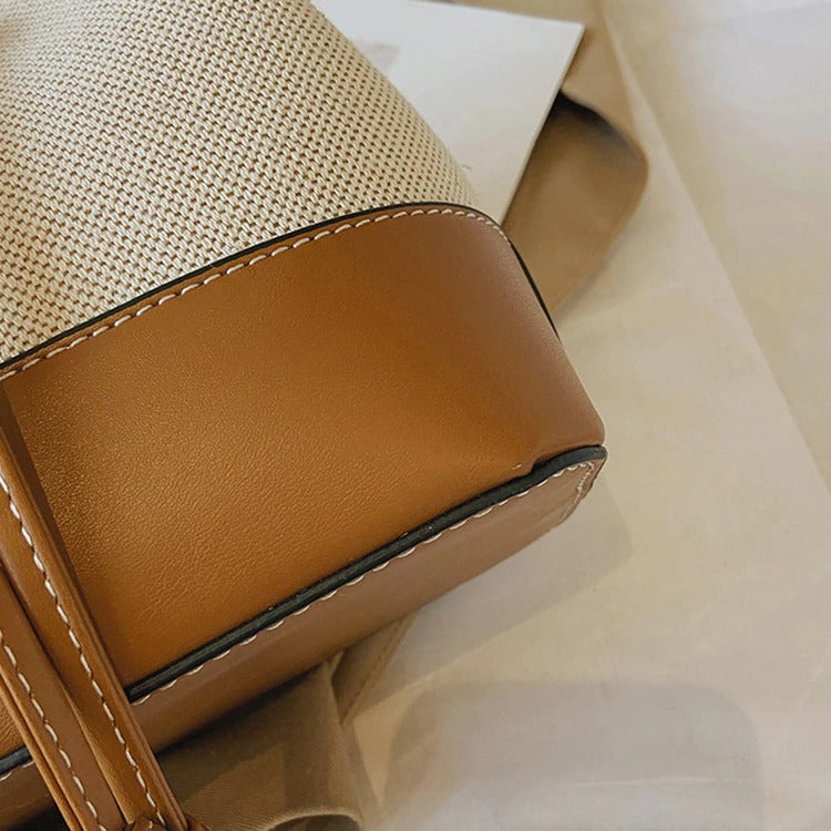Canvas-Eimer-Tasche mit veganem Lederbesatz und Kordelverschluss
