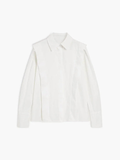 Women's white oversized shirt with structured shoulders and V-neck