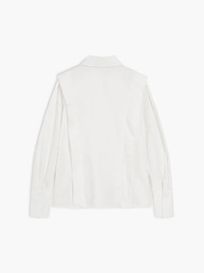 Women's white oversized shirt with structured shoulders and V-neck