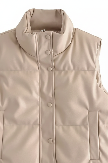 Close-up detail beige bodywarmer