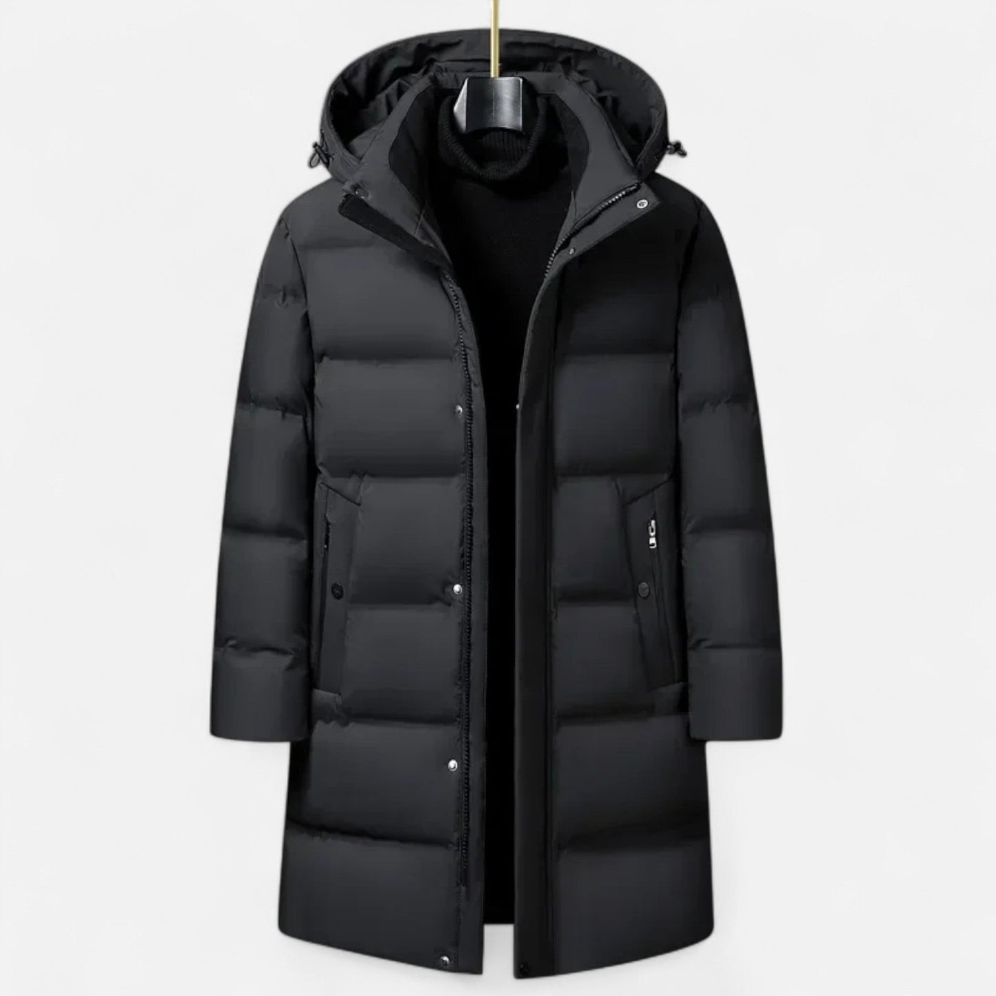 Manteau d'hiver noir pour homme, long et matelassé, avec capuche amovible. Idéal pour temps froid. Mode masculine, vêtement chaud et élégant.