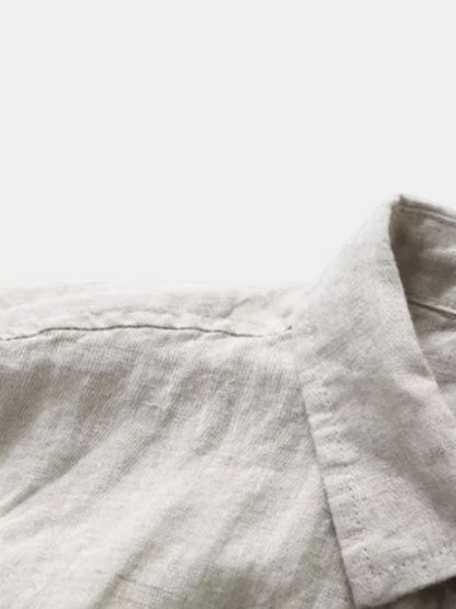 Montaracrest essential linen shirt with a cross crown design, showcasing lightweight, breathable fabric and classic style.