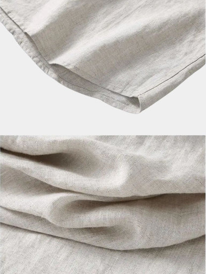 Montaracrest linen shirt with a cross crown design, featuring a relaxed fit and natural fabric for casual elegance.