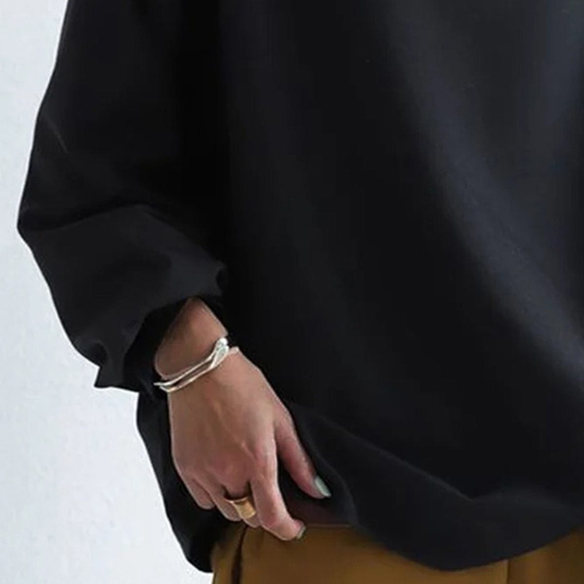 Evie | Oversized top met gedrapeerde hoge hals - Bellanza