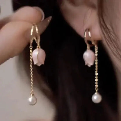 Boucles d'oreilles en perles dorées et florales