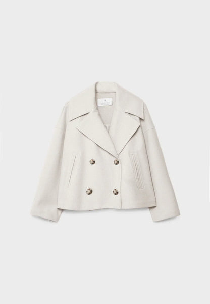 Manteau court pour femme avec double rangée de boutons et design intemporel