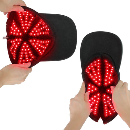 Schwarze LED-Lichttherapie-Kappe, rot leuchtend, für Haarwachstum und Kopfhautpflege.