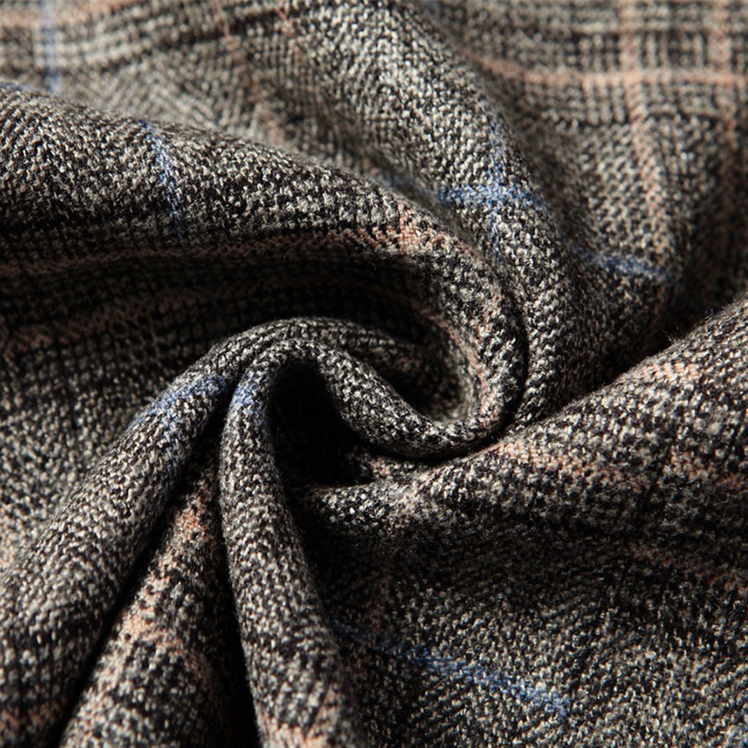 Grauer kariertes Blazermaterial, Wollmischung, Nahaufnahme, Textur, Herrenmode.
