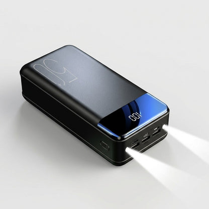 Black High-Capacity Power Bank With Built-In LED Lights On - Emergency Flashlight Feature - Jurni