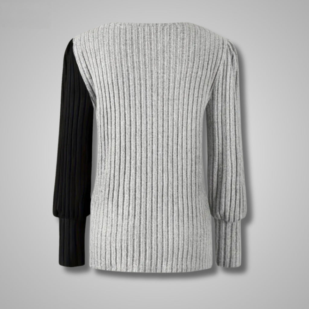 Amelia – Sweter z asymetrycznym kwiatowym wzorem