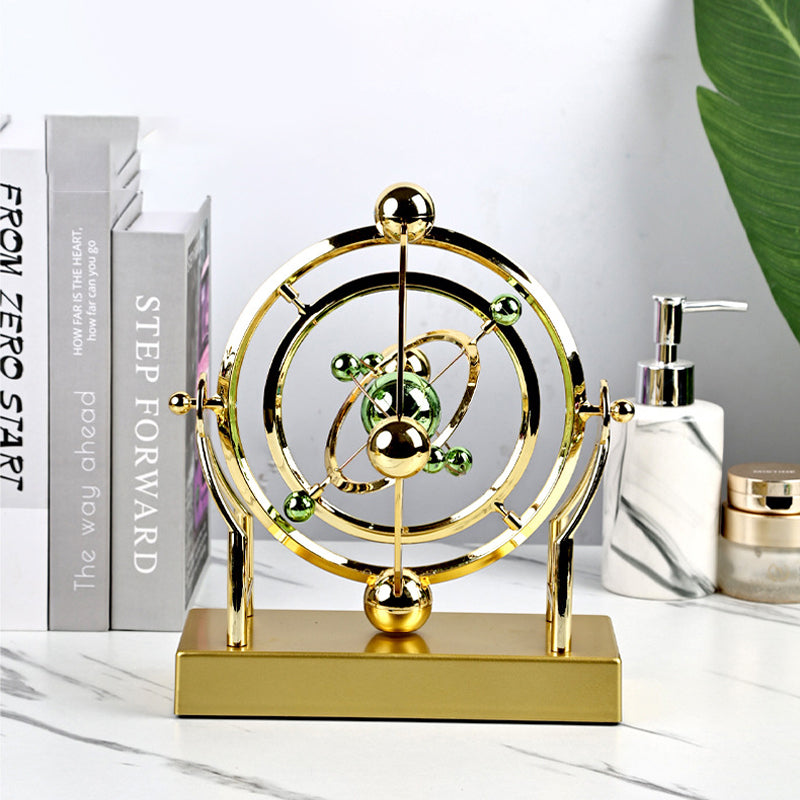 Celesto | Kinetische Design Sculptuur – Bewegend Perpetuum Mobile in Goud & Metaal
