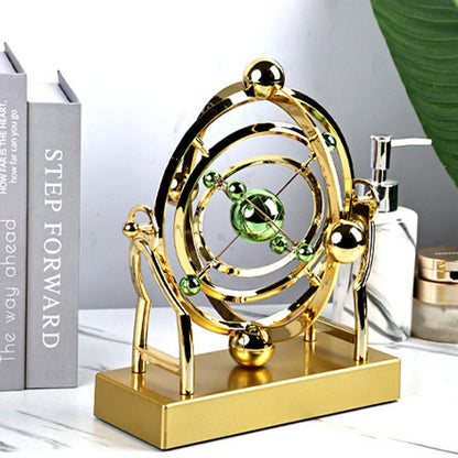 Celesto | Kinetische Design Sculptuur – Bewegend Perpetuum Mobile in Goud & Metaal