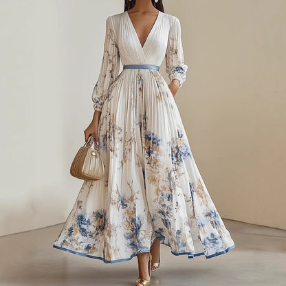 Elegant maxikjole med V-utringning og blomstermønster