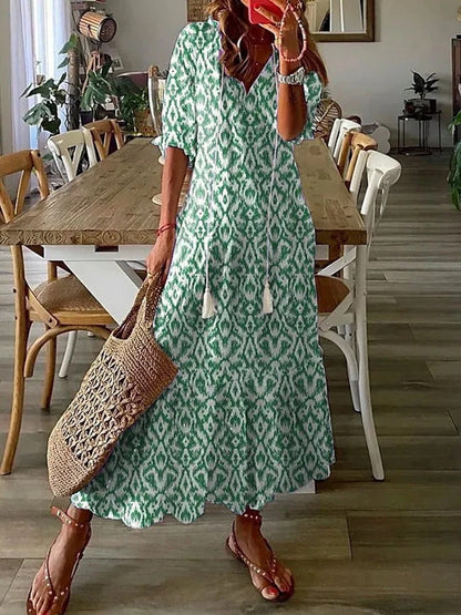 Sommarklänningar för kvinnor med blommönster och V-ringning